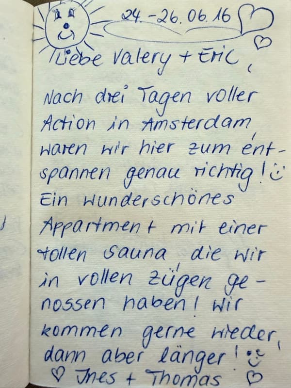 Handwritten German guestbook note about relaxing after three busy days in Amsterdam and enjoying the sauna, decorated with a smiling sun and hearts.