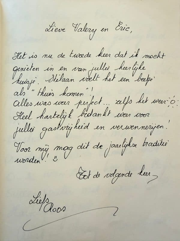 Handwritten Dutch guestbook note from a returning guest who describes the guesthouse as coming home and hopes to return every year.